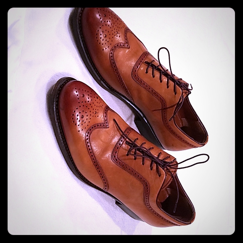 A pair of Sarar Brand Wingtip Shoes